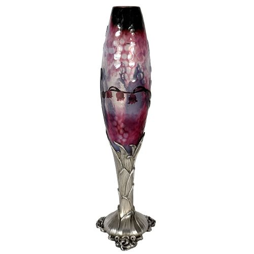 An Art Nouveau vase featuring wheel-carved purple and white glass with lily of the valley motifs set into a silver leaf-form pedestal base. View II