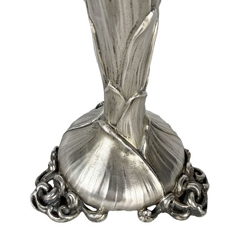 An Art Nouveau vase featuring wheel-carved purple and white glass with lily of the valley motifs set into a silver leaf-form pedestal base. View V