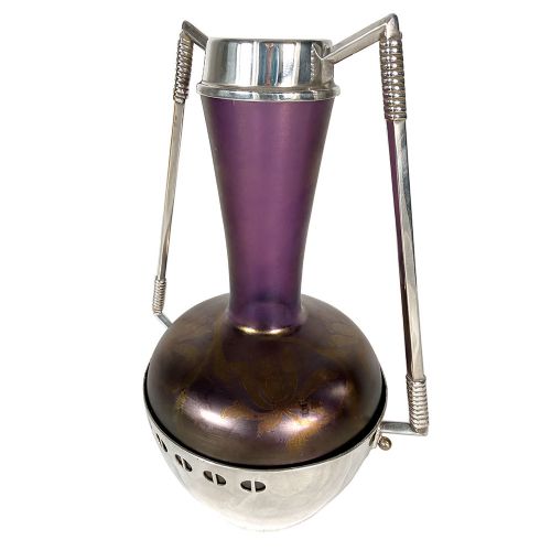 An Art Nouveau Secessionist purple iridescent glass vase held within a geometric silver-plated metal mount with high angular handles. View IV