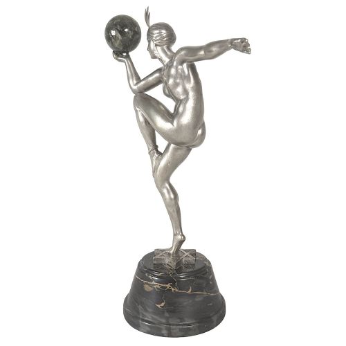 An Art Deco silvered bronze sculpture depicting a stylized female dancer balancing a sphere on her hand, mounted on a dark marble base. View V