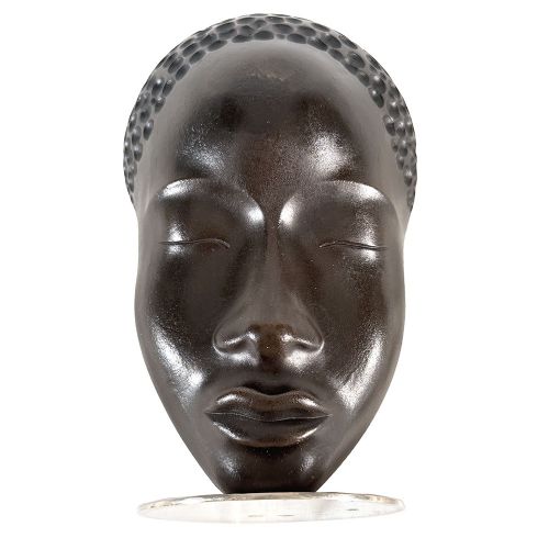 A dark patinated bronze Art Deco bust depicting a stylized female head with textured hair on a circular metal base. View II