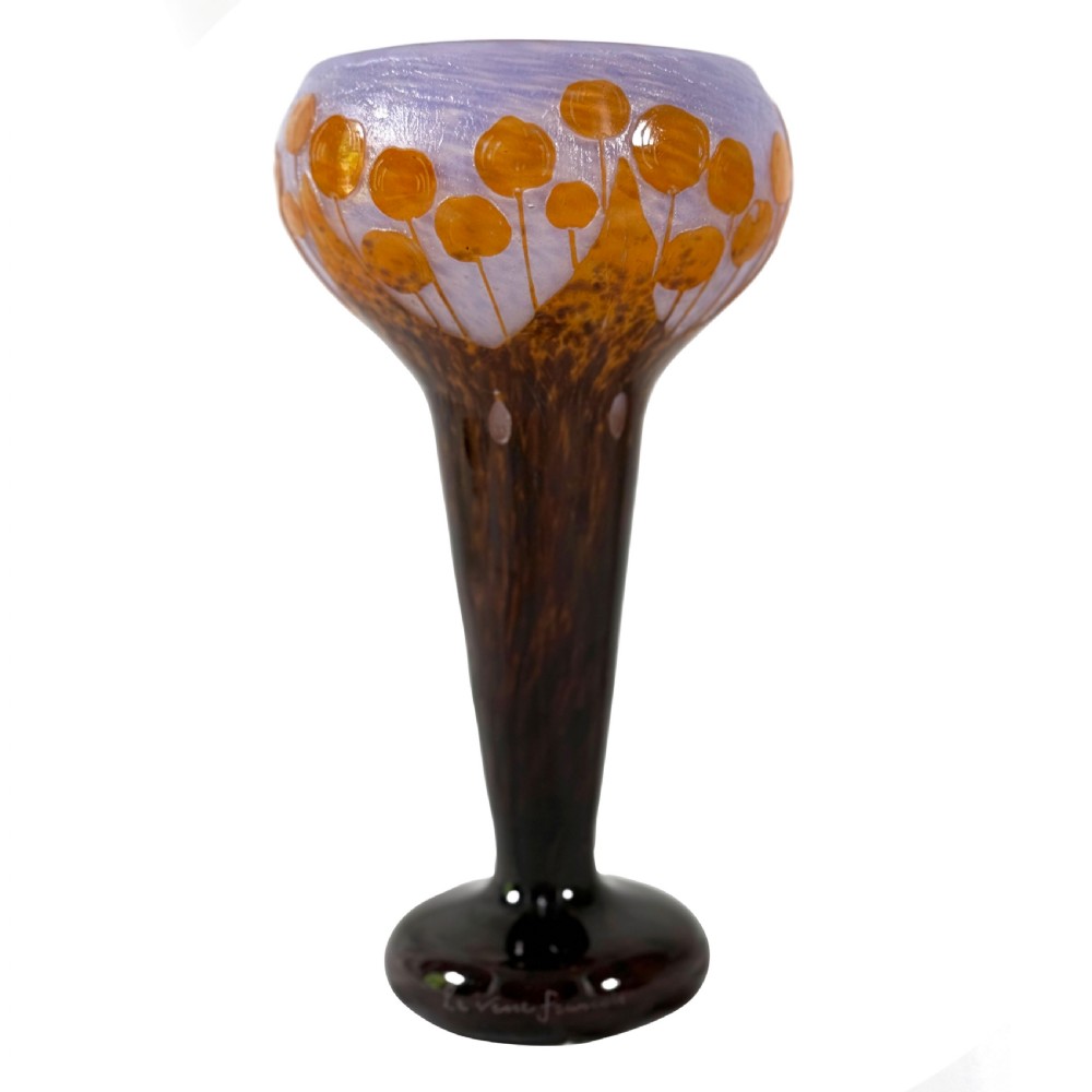 An Art Deco Le Verre Francais cameo glass vase featuring orange circular motifs on a mottled purple ground with a dark brown tapered stem and foot.