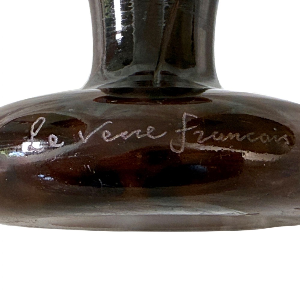 An Art Deco Le Verre Francais cameo glass vase featuring orange circular motifs on a mottled purple ground with a dark brown tapered stem and foot. View V