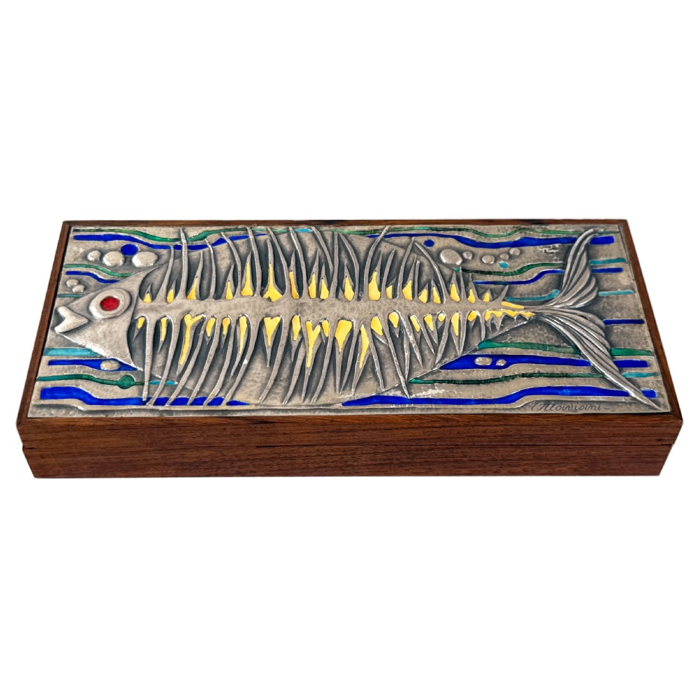 A rectangular mid-century rosewood box featuring a textured silver lid decorated with a stylised fish motif in blue, green, yellow, and red enamel.