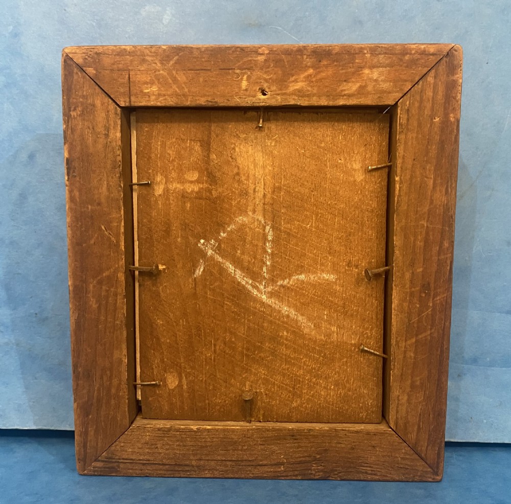 A Victorian profile silhouette portrait of a woman with detailed bronzed hair and collar, framed in a wide rosewood frame with a gilded inner slip. View VII