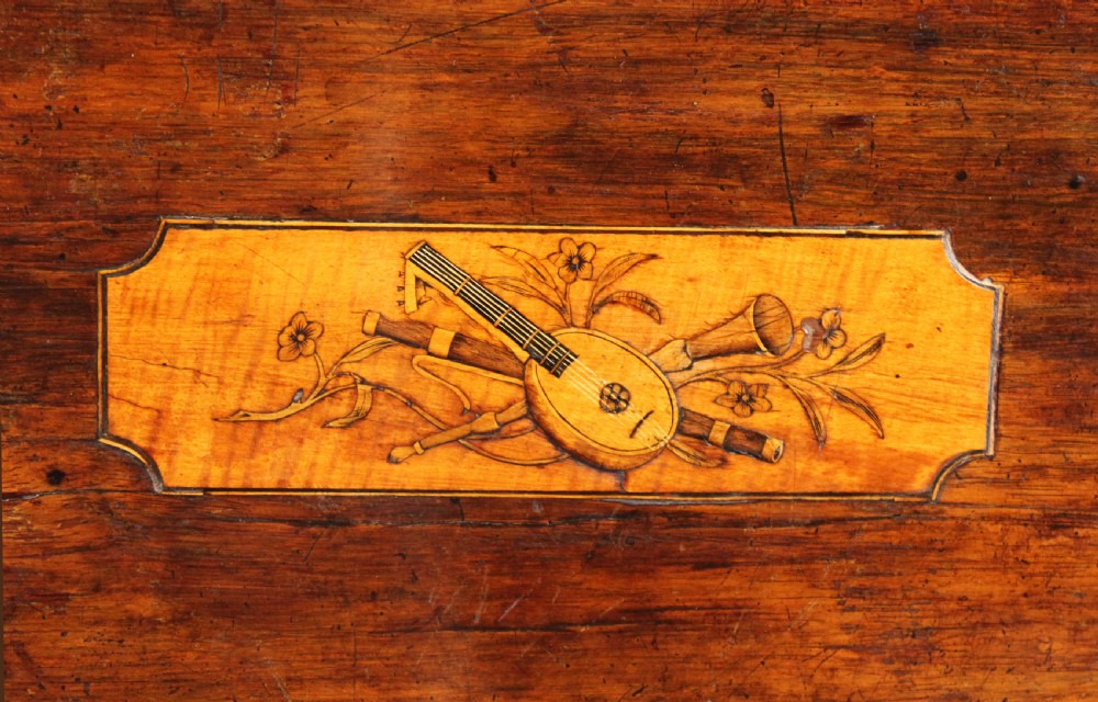 A rectangular George III style mahogany centre table featuring intricate floral marquetry inlay on the top and frieze, supported by slender cabriole legs. View V