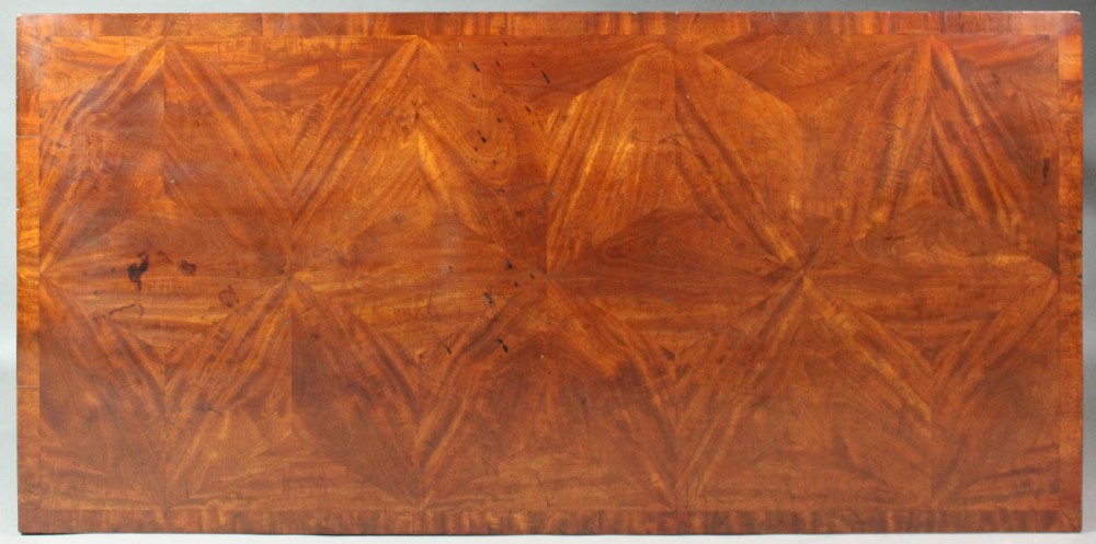 A dark mahogany rectangular Chippendale side table with a parquetry top, blind fretwork carved frieze, pierced corner brackets, and straight square legs. View IV