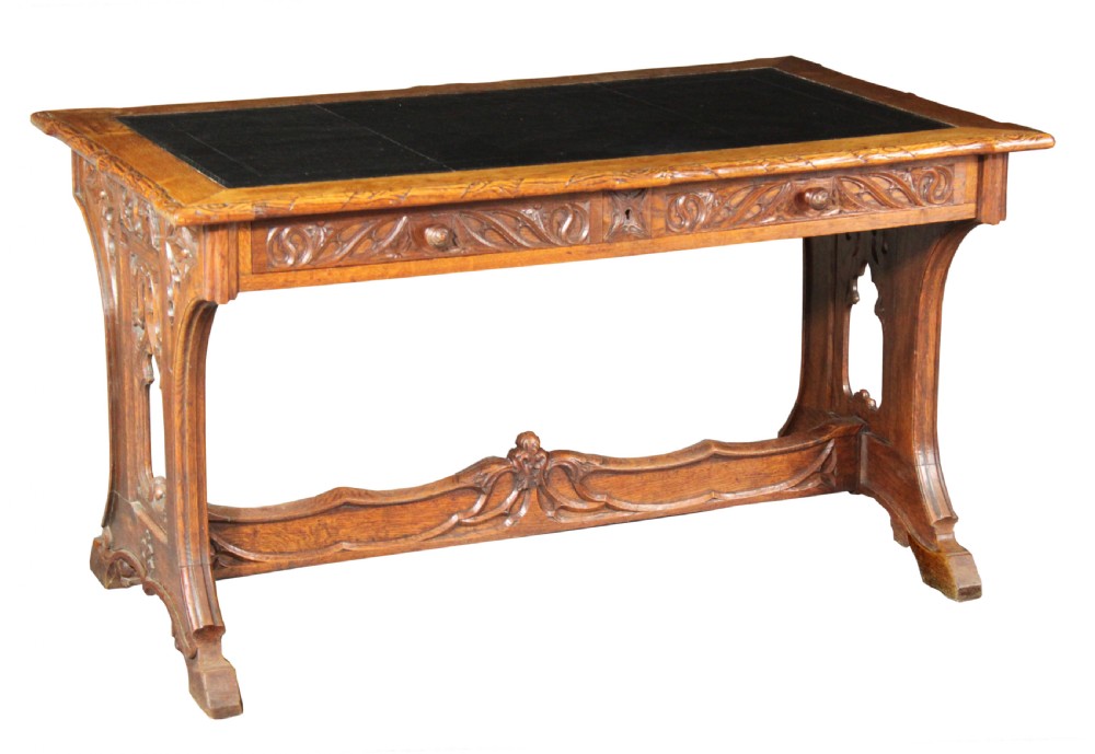 Neo-Gothic carved oak writing table