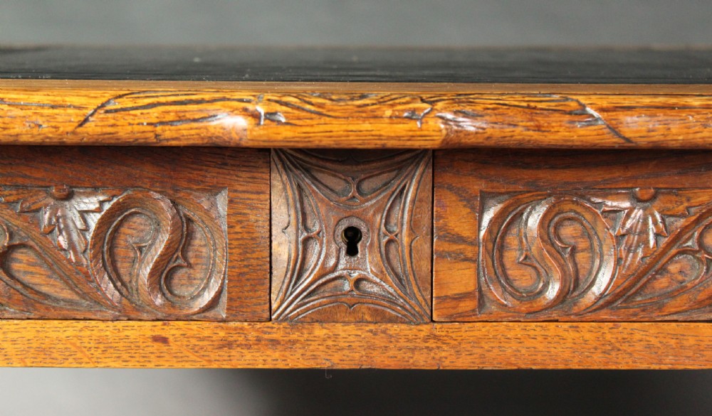 Neo-Gothic carved oak writing table View IV