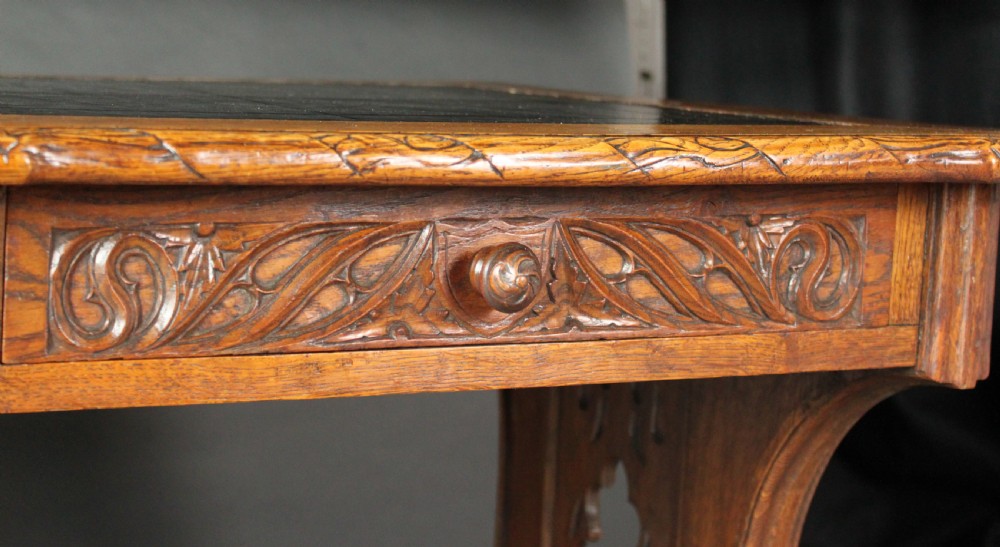 Neo-Gothic carved oak writing table View V