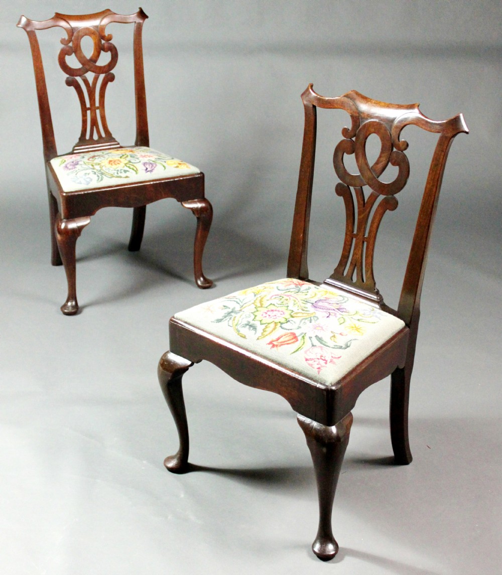 Pair of George II mahogany cabriole leg chairs