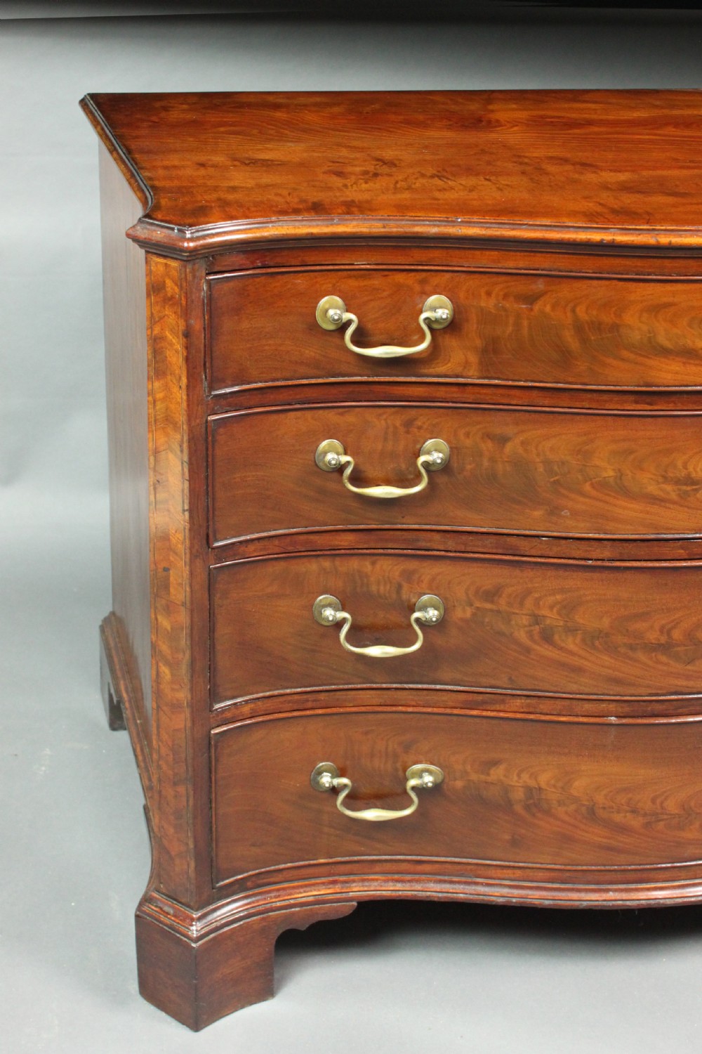Antique mahogany serpentine chest View V