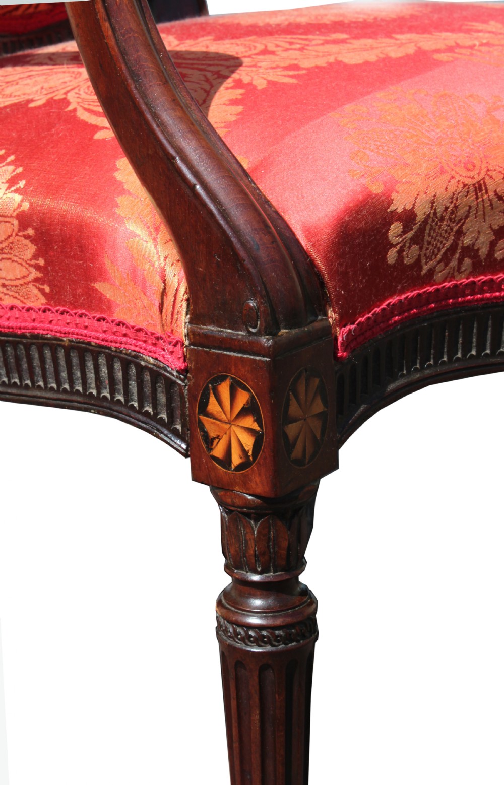 A pair of antique George III mahogany armchairs featuring oval backs and patterned red and gold damask upholstery. View X