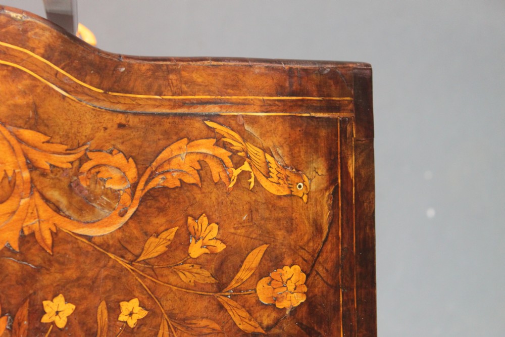 An antique Dutch walnut card table featuring detailed floral marquetry inlay, a serpentine frieze with a single drawer, and slender legs. View IV