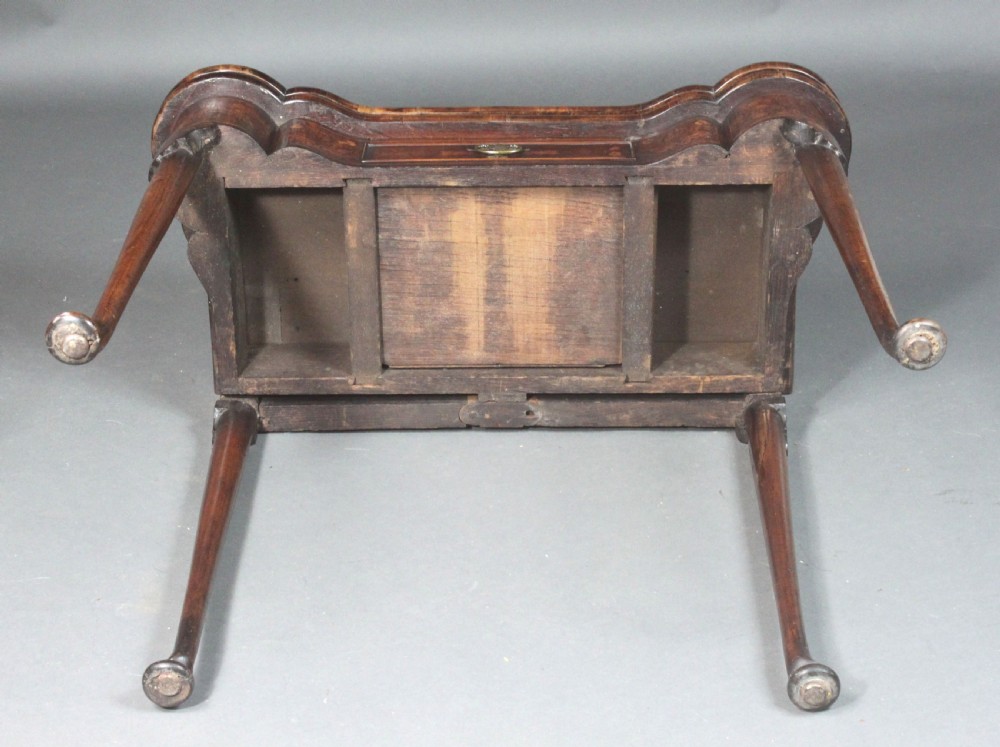 An antique Dutch walnut card table featuring detailed floral marquetry inlay, a serpentine frieze with a single drawer, and slender legs. View VIII