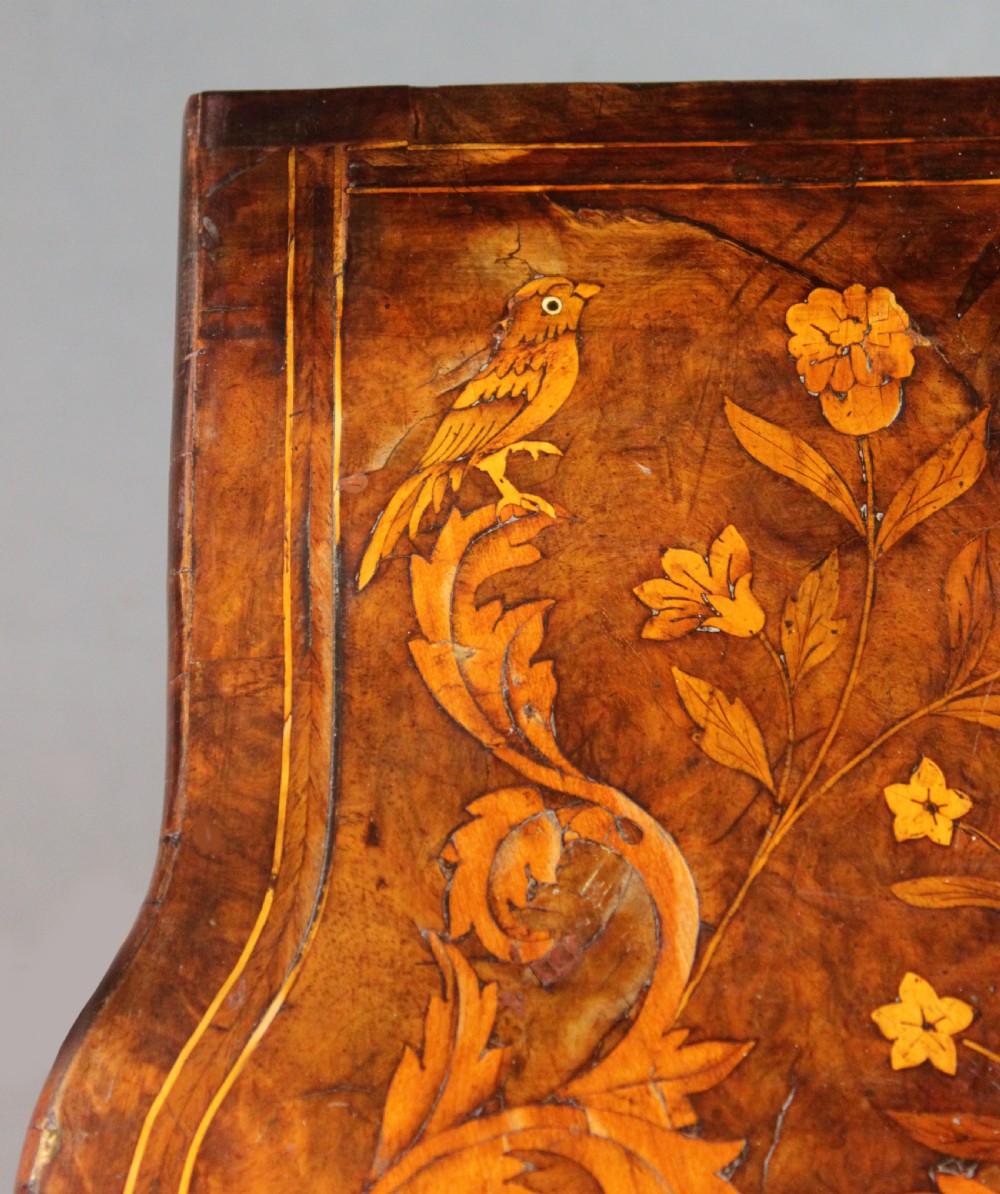 An antique Dutch walnut card table featuring detailed floral marquetry inlay, a serpentine frieze with a single drawer, and slender legs. View XII
