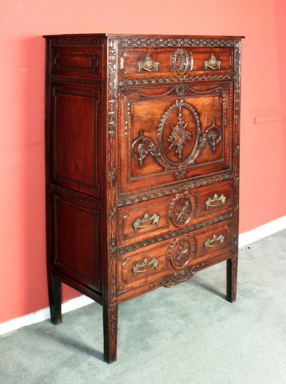 An antique Louis XVI carved walnut escritoire cabinet with an open fall-front flap showing a green writing surface and internal storage drawers. View II