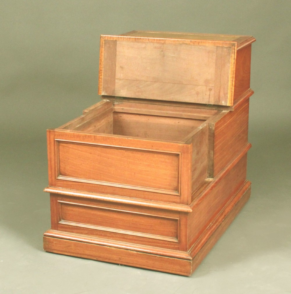 A three-tiered antique satinwood bed step unit featuring golden brown leather inset treads and rectangular panel detailing. View III