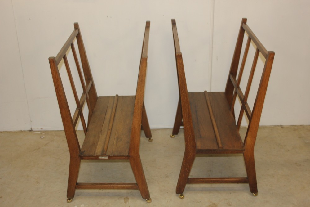 A pair of folio stands magazine stands 