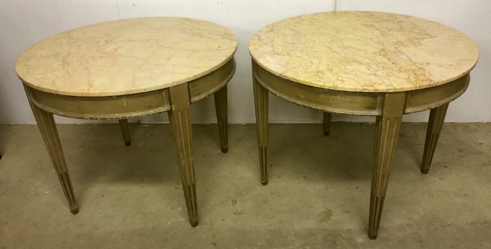 A pair of marble top tables 