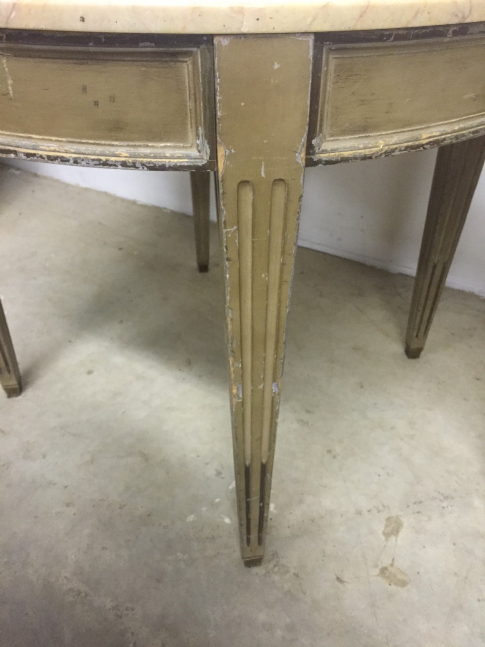A pair of marble top tables  View III