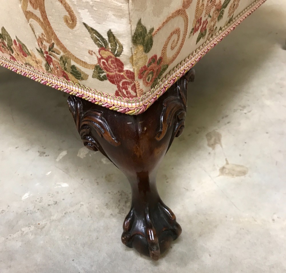 Wing back armchair and near matching stool View IV