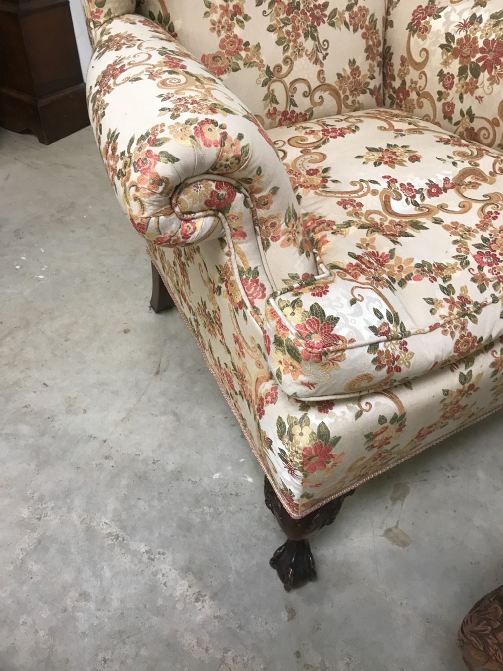 Wing back armchair and near matching stool View V