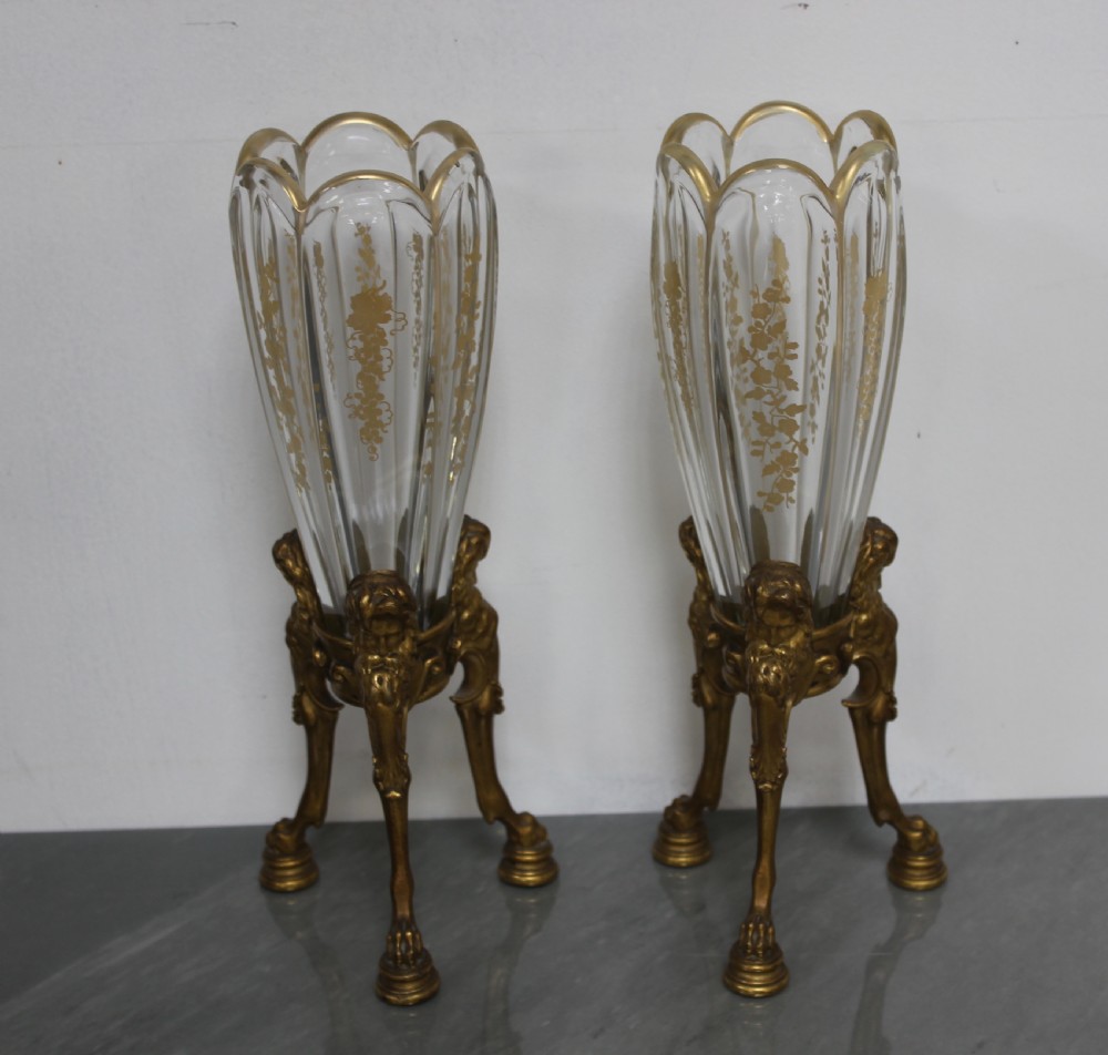 Pair of bronze and glass vases