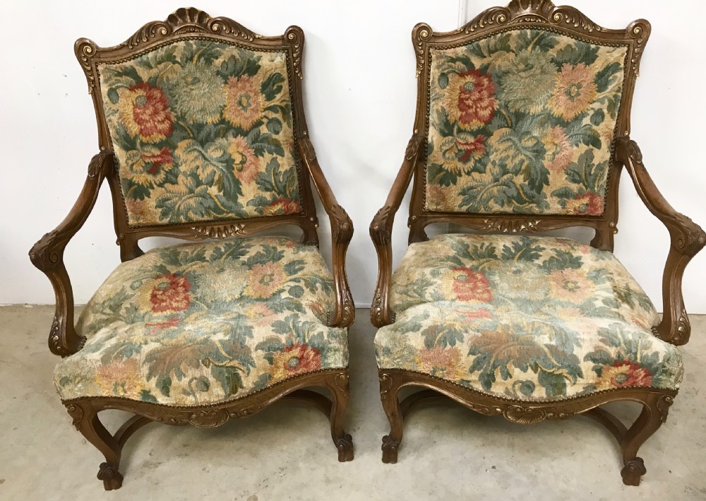 A Pair of french walnut armchairs 