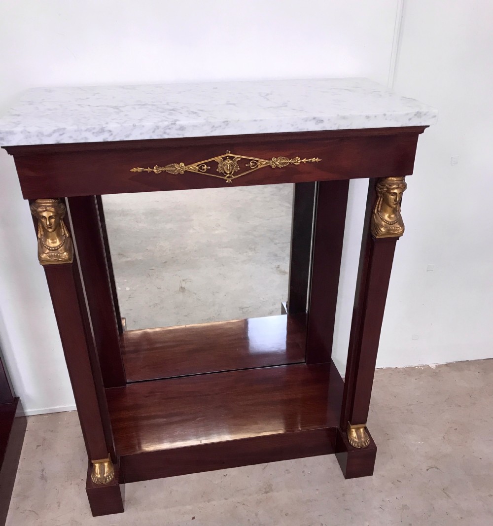 A Pair of empire console tables View II