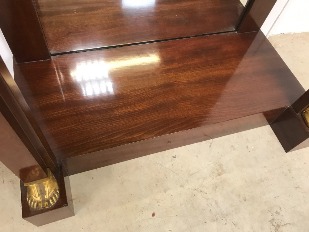 A Pair of empire console tables View IV