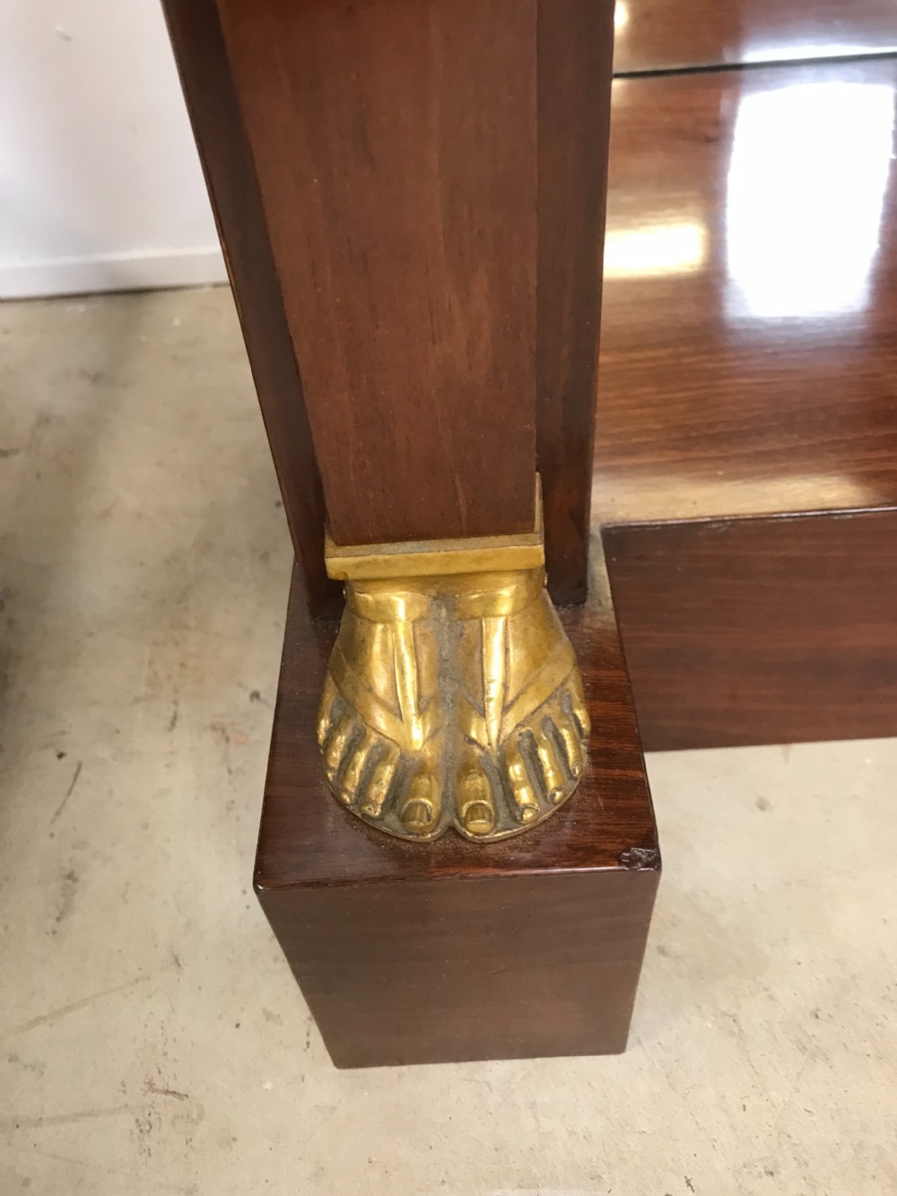 A Pair of empire console tables View V