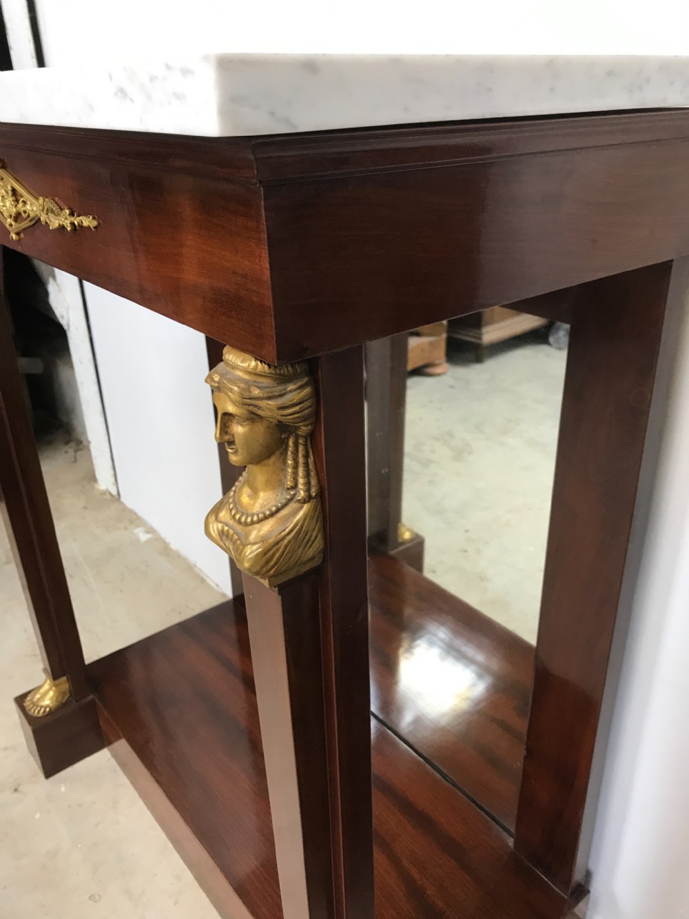 A Pair of empire console tables View X