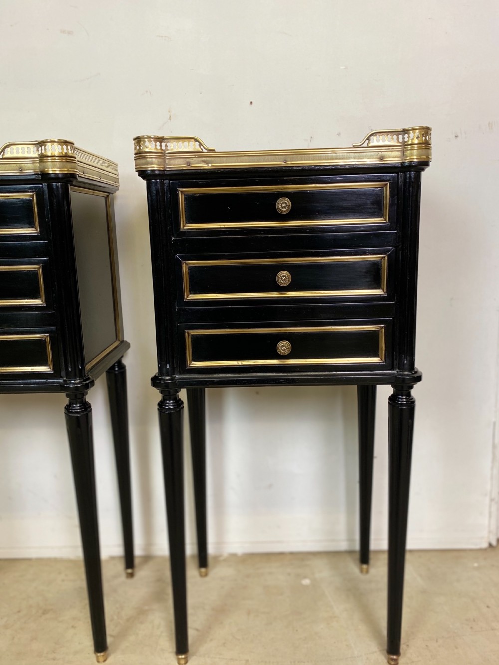 Pair of French Empire Ebonised Nightstands View II