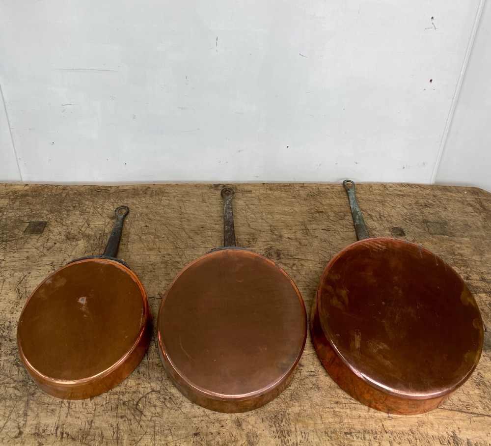 Set of three 19th Century Copper pans View II