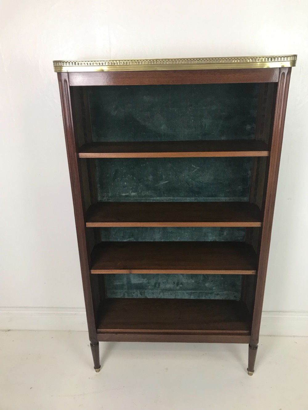 French mahogany and brass open bookcase 