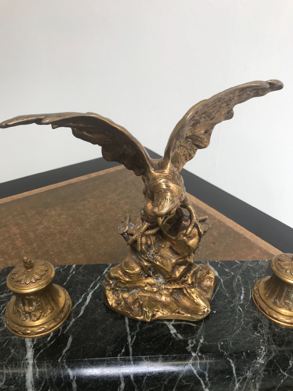 A French gilt bronze eagle sculpture mounted on a black marble base with two lidded ink pots, a pen recess, and an accompanying rocker blotter. View IV