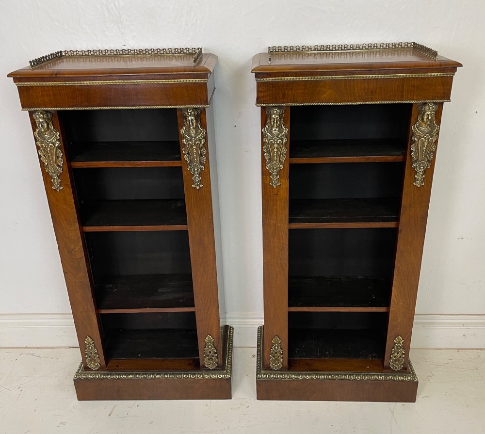 Pair of Ormolu mounted walnut Bookcases 