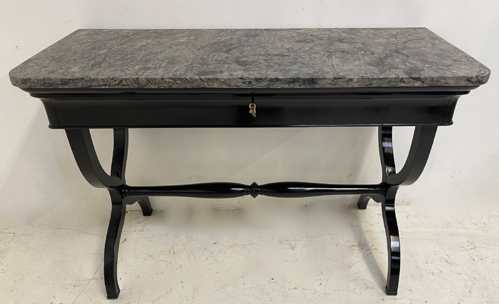 A French empire console table with marble top 