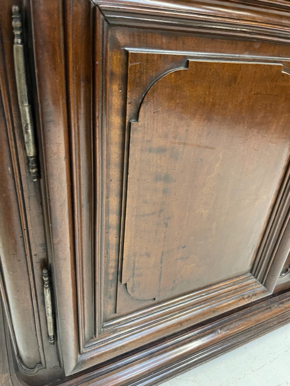 An antique French walnut buffet featuring two top drawers above two moulded panel cupboard doors with iron hardware and a solid plinth base. View XI