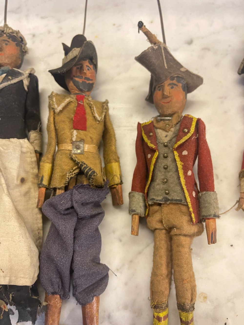 An antique wooden and paper toy puppet theatre labelled Opera, featuring miniature costumed marionettes on a painted classical stage. View XVIII