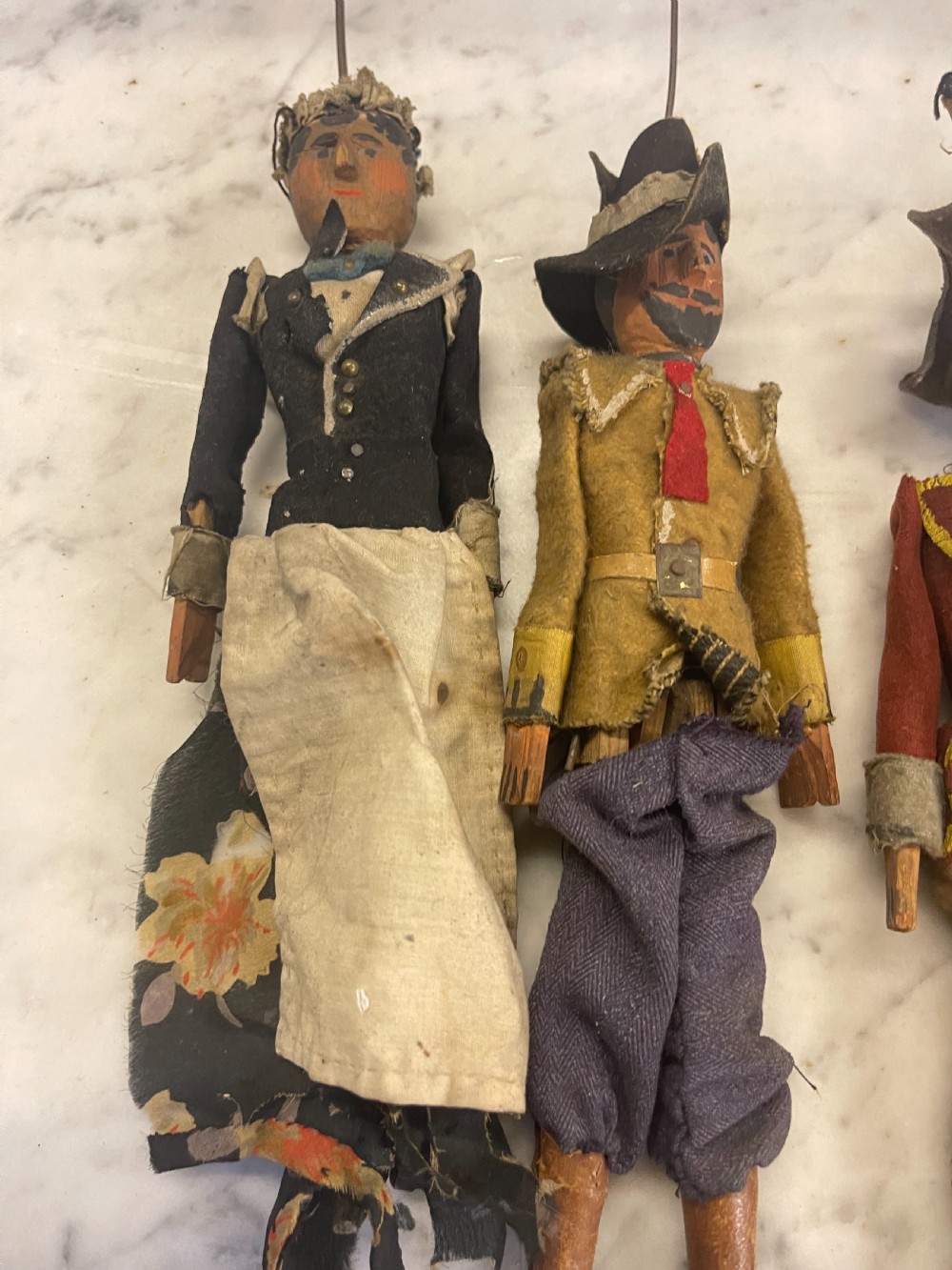 An antique wooden and paper toy puppet theatre labelled Opera, featuring miniature costumed marionettes on a painted classical stage. View XIX