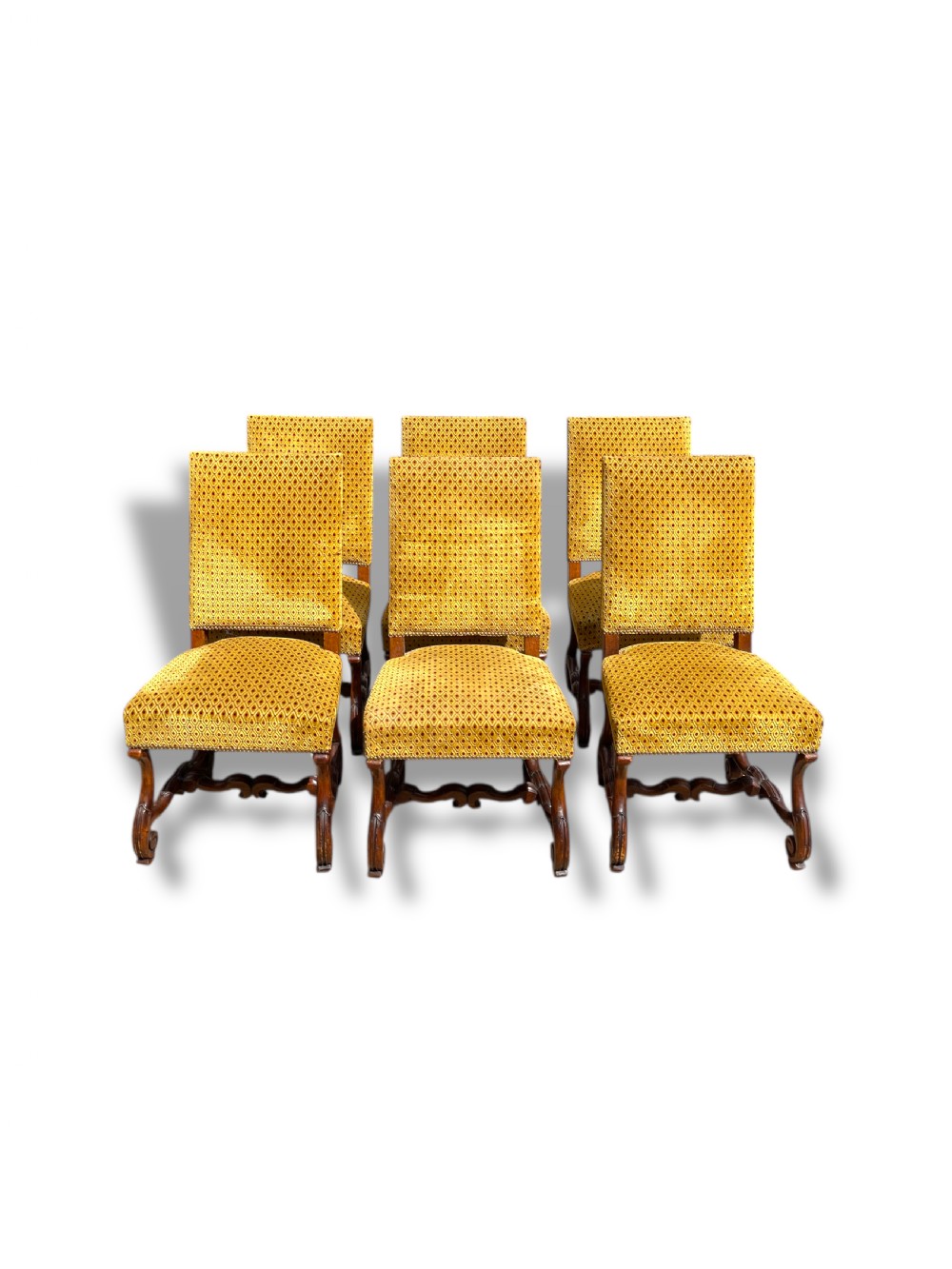A set of six French walnut dining chairs upholstered in gold patterned fabric with carved wooden legs and stretchers. View IV