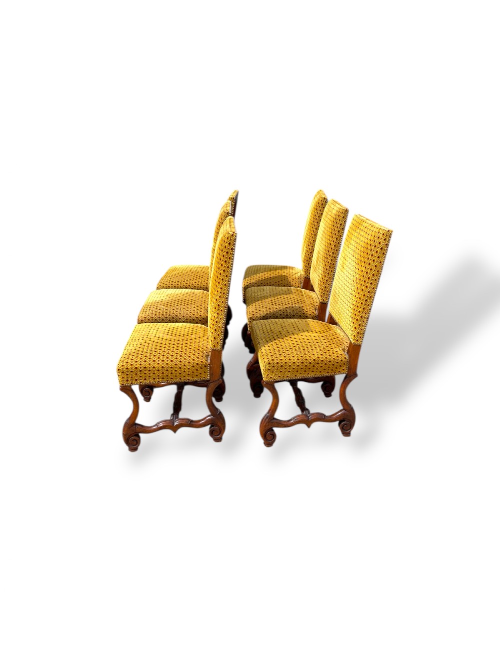 A set of six French walnut dining chairs upholstered in gold patterned fabric with carved wooden legs and stretchers. View VI