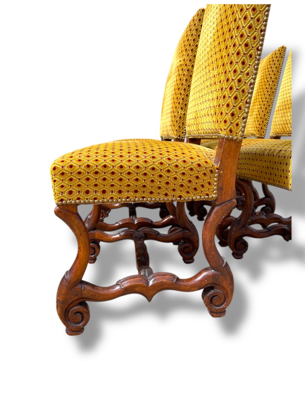 A set of six French walnut dining chairs upholstered in gold patterned fabric with carved wooden legs and stretchers. View VII