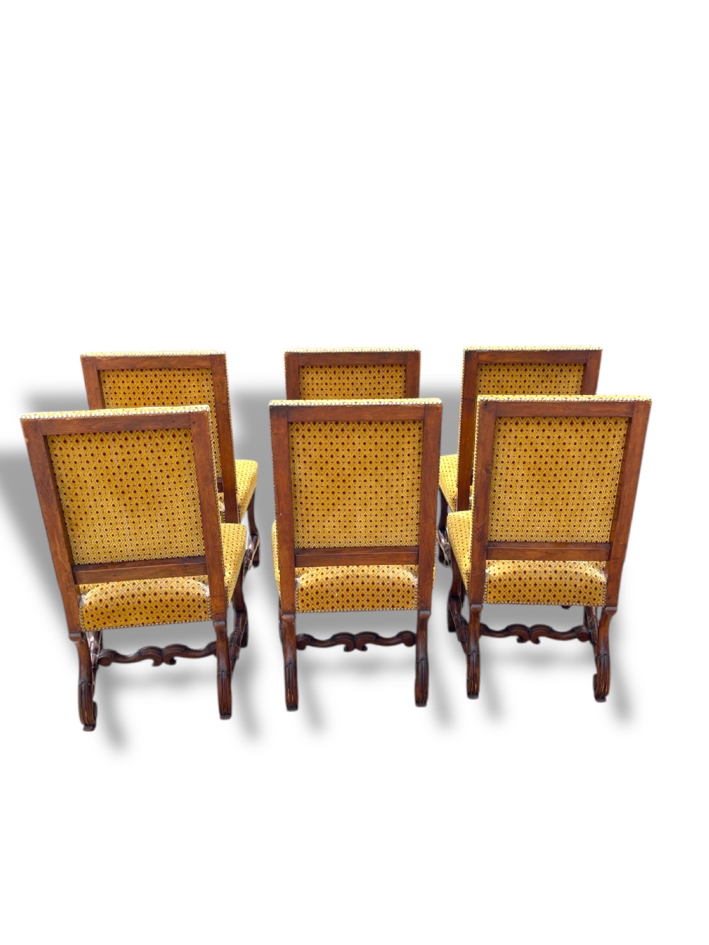 A set of six French walnut dining chairs upholstered in gold patterned fabric with carved wooden legs and stretchers. View X