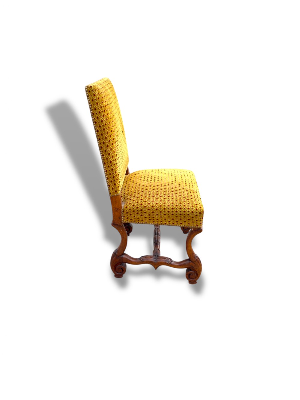 A set of six French walnut dining chairs upholstered in gold patterned fabric with carved wooden legs and stretchers. View XIV