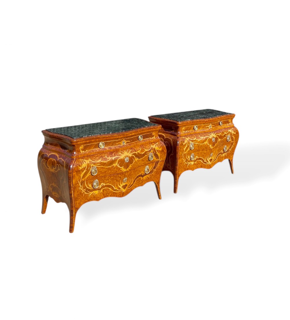 A pair of Italian bombe commodes featuring intricate floral marquetry timber inlays, dark green marble tops, and brass handles. View III
