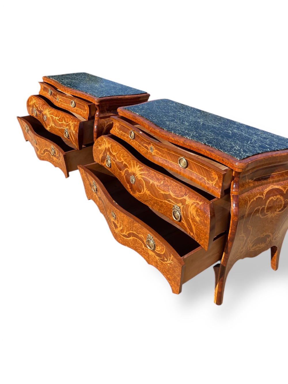 A pair of Italian bombe commodes featuring intricate floral marquetry timber inlays, dark green marble tops, and brass handles. View XVII