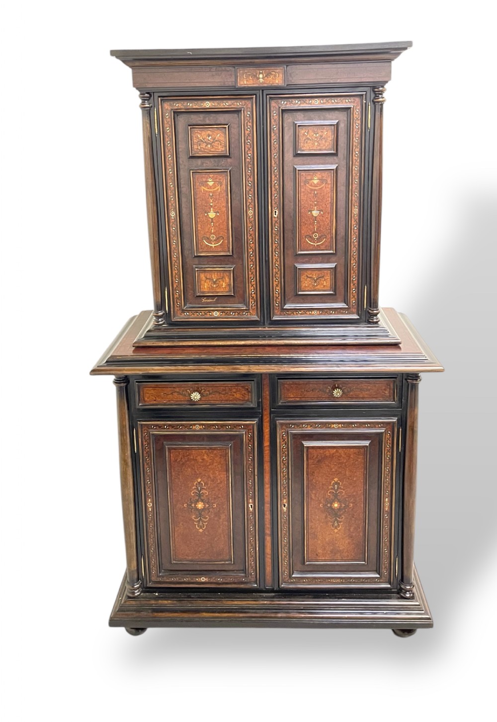 A two-part dark walnut Spanish buffet cabinet featuring detailed marquetry and bone inlay across four panelled cupboard doors and two upper drawers.